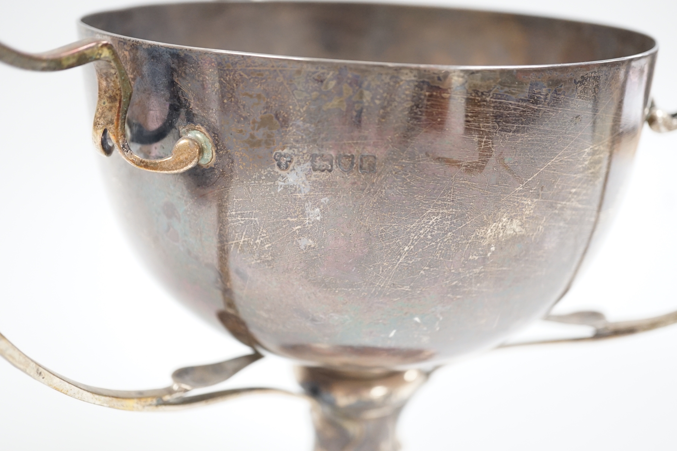 A George V silver tri-handled presentation cup, with engraved inscription, Charles Boyton & Son Ltd, London, 1912, height 19.6cm, 26.5oz.